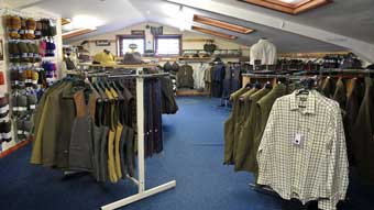 Interior of the Trulock and Harris shop showing the clothing area